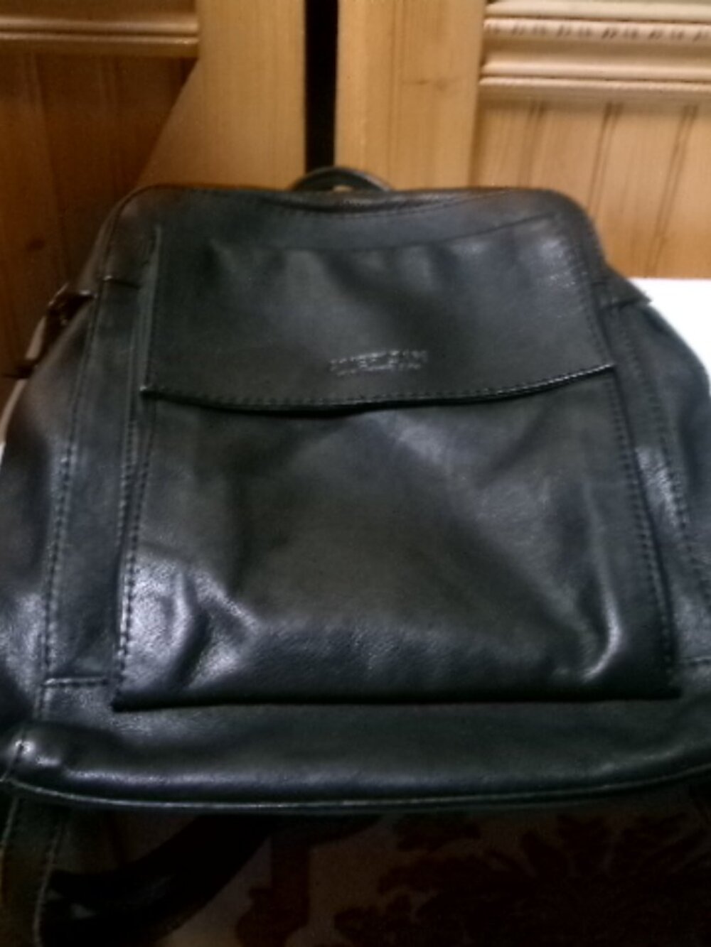 American Leather black backpack convertible has top handle front and back pouch